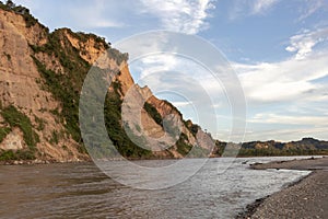 Sunset at Beni river cliffs, adventure in jungles of Madidi national park, Amazon river basin in Bolivia, South America