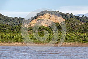 Sunset at Beni river cliffs, adventure in jungles of Madidi national park, Amazon river basin in Bolivia, South America