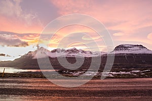 The sunset in Berufjordur fjord in east icelandic countryside photo