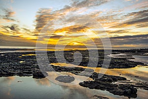 Sunset on Bexhill beach in East Sussex, England