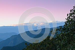 Sunset beyond layers of Himalayan mountain range, Sikkim