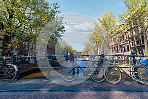 Sunset on bicycles at Amsterdam Bridge