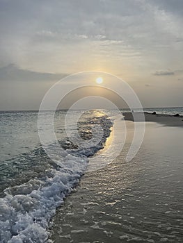 Sunset at Bikini Beach at Omadhoo Island, Maldives