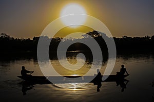 Sunset on the Black Volta River People in a Canoe Africa