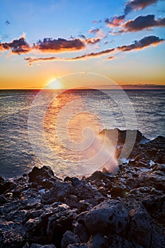 Sunset and blowhole