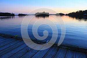 Sunset from the boat dock, Lake of the Woods, Kenora, Ontario photo