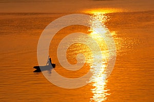 Sunset and boat on the river