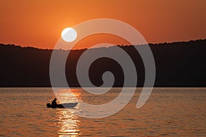 Sunset. Boat in Trinity Bay.