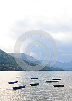 Sunset with boats at Fewa lake