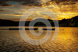 Sunset with boats at ladybower