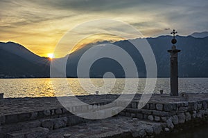 Sunset at Boka Kotor Bay, near town of Perast, Montenegro. View from Gospa od Skrpjela the island Our Lady of the Rocks