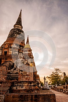 Sunset and Buddha statue AYUTTHAYA Thailand