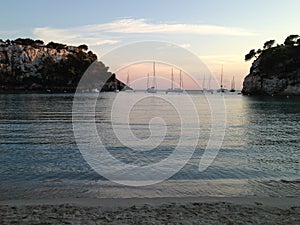 Sunset at Cala Galdana, Menorca Island, Spain photo