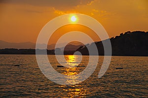 Sunset on the Calis Beach on the Aegean Sea