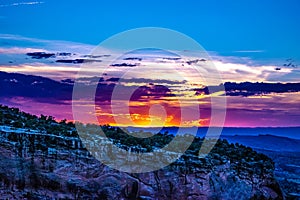 Sunset through the Canyon Gorge on the monuments in Grand Junction, Colorado