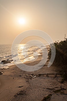 Sunset on Cape Coast beach, Ghana photo