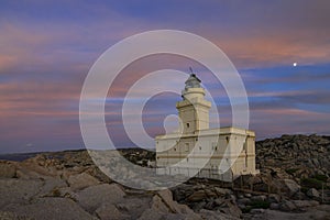 Sunset at the Capotesta lighthouse in Sardinia photo