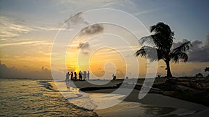 Sunset on Caribbean Beach with Palm Tree on the San Blas Islands between Panama and Colombia.