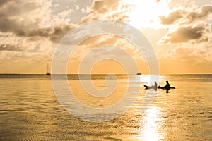 Sunset in the Caribbean sea by Caye Caulker island, Belize