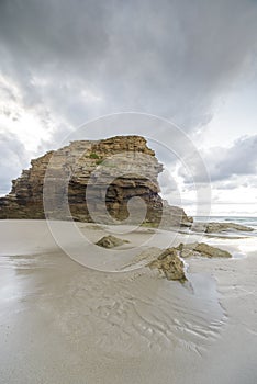 Sunset at the Catedrales or Augas Santas beach, in Ribadeo. Lugo, Galicia photo