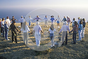 A sunset ceremony for an earth new age gathering in Big Sur California