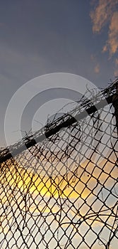 Sunset through the chainlink