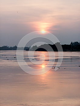 Sunset at Chao Phraya river side