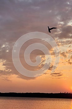 sunset on child\'s lake at duck mountain provincial park