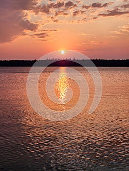 sunset on child\'s lake at duck mountain provincial park