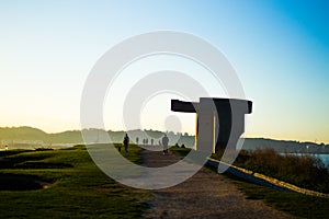 Sunset in Chillida`s Eulogy to the Horizon Elogio del Horizonte in Cerro de Santa Catalina, in Gijon, Asturias, Spain. Art