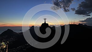 Sunset At Christ The Redeemer Statue In Rio De Janeiro Brazil.