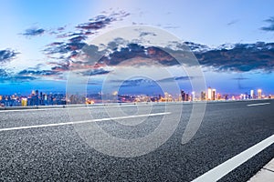 Sunset cityscape and asphalt road in Chongqing