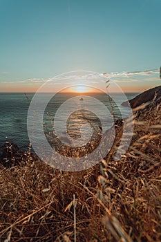 A sunset from the cliff with a lot of peaks