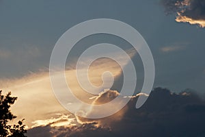 SUNSET CLOUD WITH SEPARATION OF LIGHT