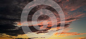 Sunset Clouds background. Dramatic Clouds Sunset Background. Sky with clouds in Sunrise. Sunrise with clouds in various