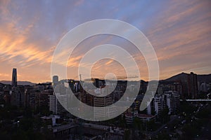 Sunset clouds and cityscape