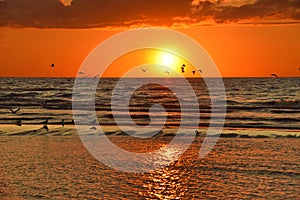 Sunset and clouds observing over baltic sea