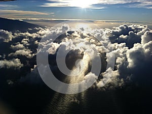 Sunset with clouds over ocean water