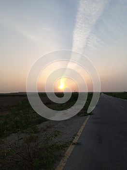 Sunset clouds reflection light highway