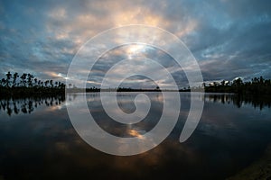 Sunset cloudscape over Pine Glades Lake in Everglades National Park, Florida.