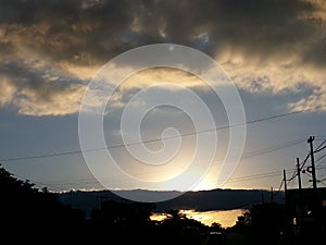 Sunset with cloudy sky photo