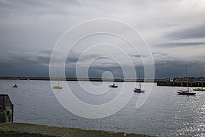 Sunset with cloudy sky , evening in Dun Laoghaire harbour , Dublin ,Ireland.