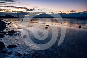 Sunset at coast of the lake. Nature landscape. Nature in Slovakia. Reflection, blue sky and yellow sunlight. landscape during