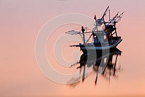 Sunset Coastal fisheries boat in Thailand