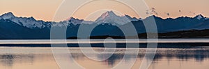 Sunset colors and reflection of Mount Cook. Aoraki/Mount Cook National Park, South island, New Zealand