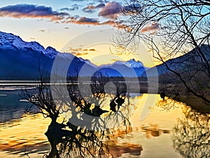 Sunset colours on the mountain lake Wakatipu on the South Island of New Zealand