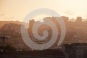 Sunset contre-jour view of Lisbon from Miradouro da Senhora do Monte viewpoint. Lisbon, Portugal photo