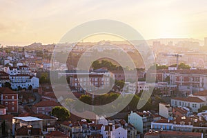 Sunset contre-jour view of Lisbon from Miradouro da Senhora do Monte viewpoint. Lisbon, Portugal photo