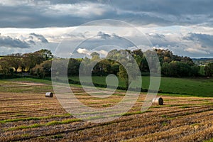 Sunset country village scenic view landscape farming straw bales Cork Ireland