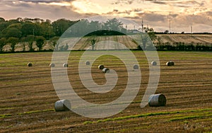 Sunset country village scenic view landscape farming straw bales Cork Ireland